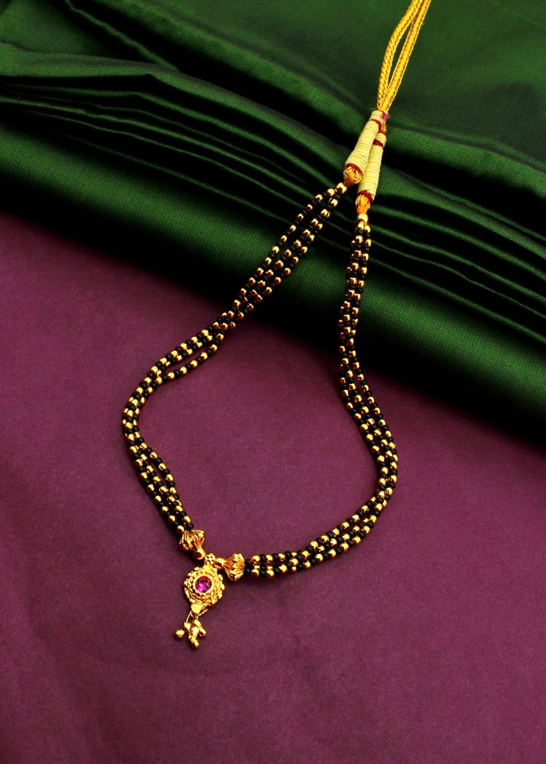 BLACK WITH GOLDEN BEADS MANGALSUTRA